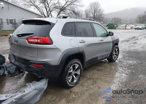 2015 Jeep Cherokee Trailhawk from USA, damaged, VIN 1C4PJMBS5FW779855